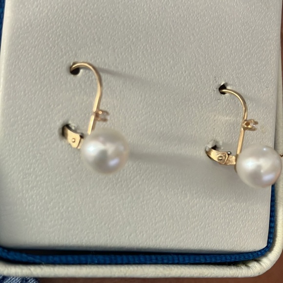 Rose gold studs from Mervins’s jewelry, genuine pearl dangling from JCPenney. - Picture 2 of 4